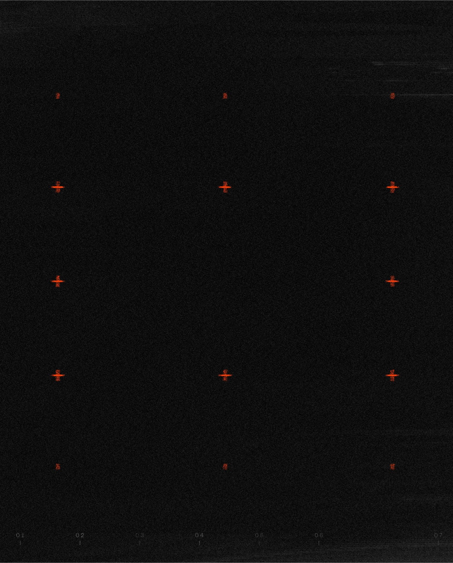 Dark background patterned with red crosshairs 