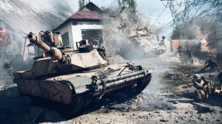 A building explodes behind a group of soldiers engaged in battle.