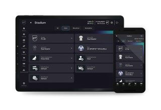 Um tablet e a tela de um telefone celular mostrando a interface do aplicativo FC Companion para o menu de Estádios.
