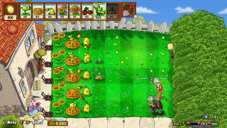 A daytime lawn in Plants vs. Zombies featuring advanced defenses. Rows of sunflowers, kernel-pults, pumpkins, and double Peashooters are protecting against various zombies, including pole vaulters and coneheads. The player has 400 sun and a total of $8,980.