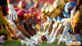 A shot of College Football 25 football players at the starting line, ready to snap the ball