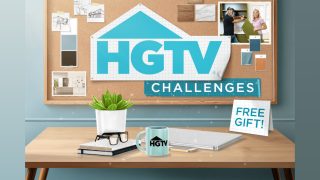 A wooden desk with a tent card on it that reads "Free Gift". On the wall is a pinboard with the HGTV logo and the word "challenges" pinned on it.