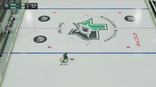 An in-game view of a lone hockey player on the ice, with the player indicator and puck highlight set to their maximum size for visibility.