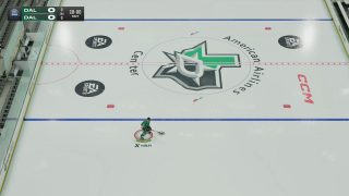 An in-game view of a lone hockey player skating on the ice, with the player indicator and puck highlight set to a medium size.