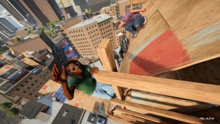 Multiple skaters on a large wooden ramp on top of a building. Skater in the forefront is climbing up as skaters in the background are rolling down the ramp.