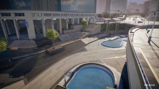 Picturesque area for skateboarding, with 2 water canals offset center. Elevated road way to the right. 