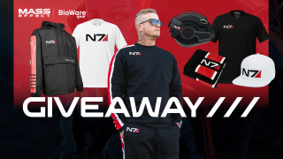Afbeelding van de BioWare Gear Giveaway-items. Toont een persoon met een N7-shirt met lange mouwen, met andere shirts, jassen en mutsen op de achtergrond. Tekst leest: "GIVEAWAY"