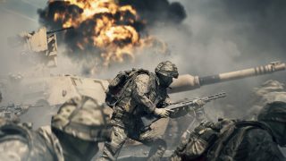 Soldiers in combat gear advance amidst smoke and chaos, with a tank and a large explosion in the background, capturing the intensity of Battlefield 6 warfare.